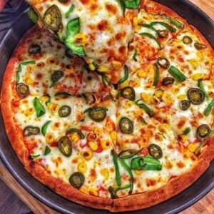 Indian green wave pizza