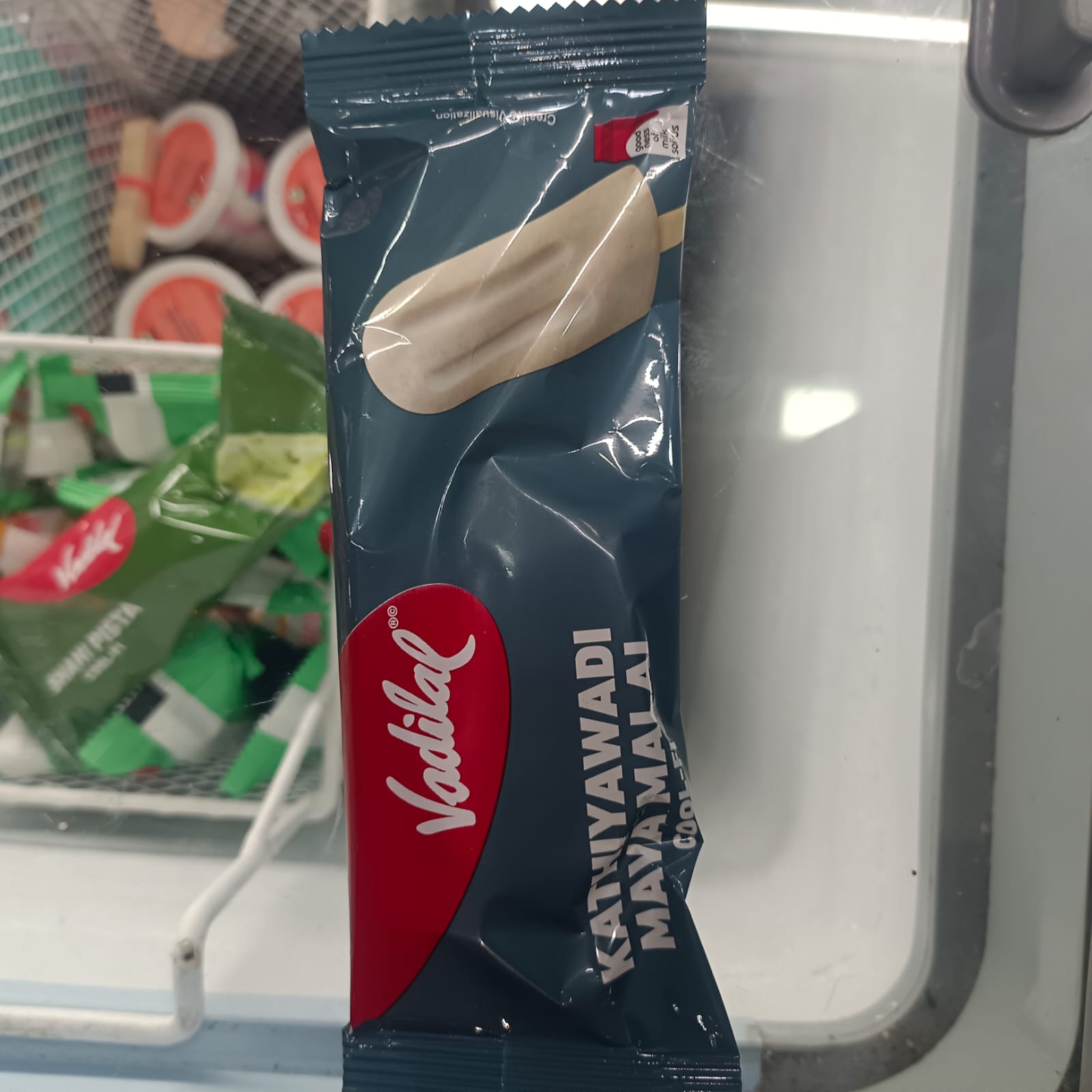 Kathiyawadi mava malai coolfi ice cream + 2 tissue
